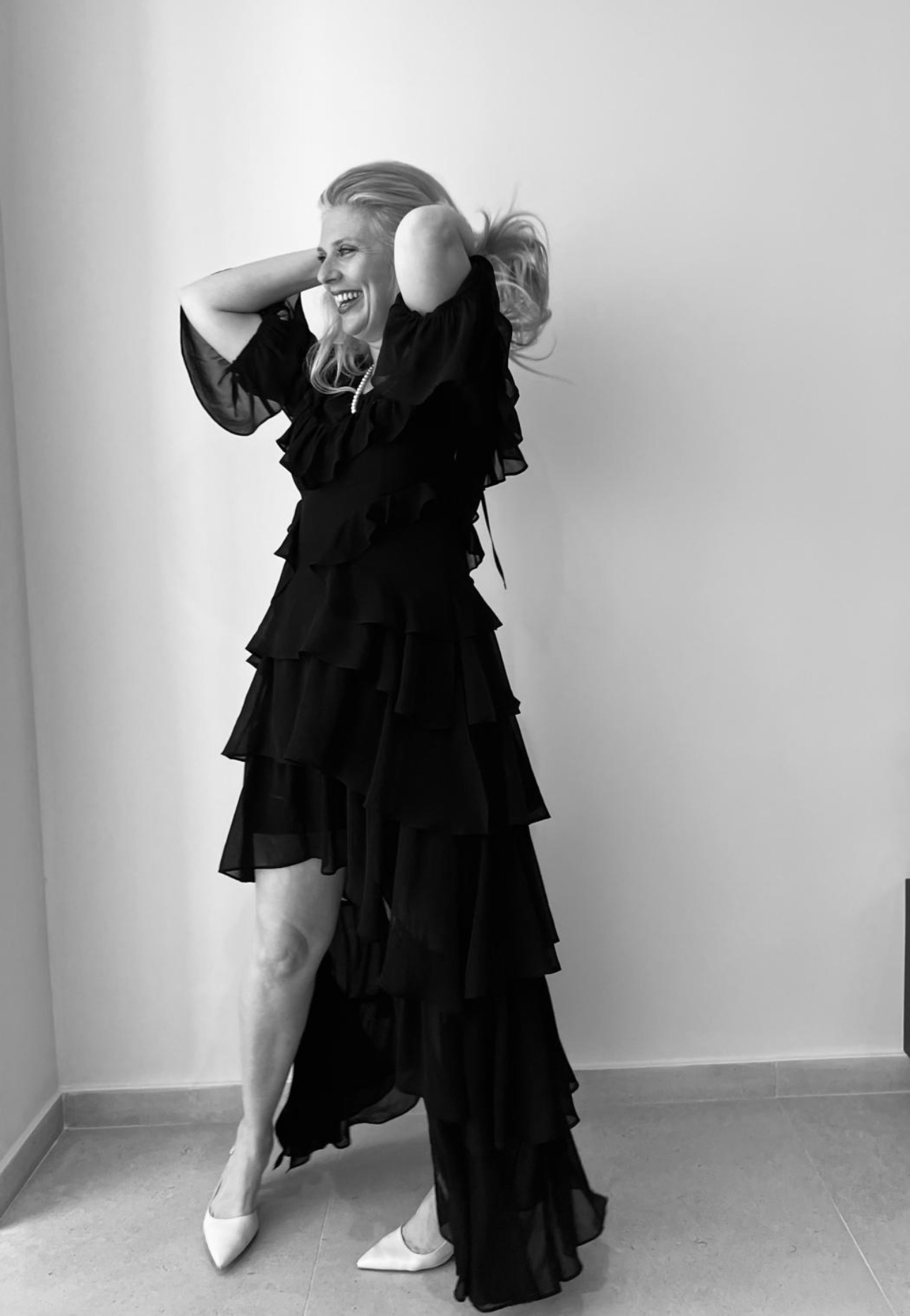 Gayle Berry laughing, hand to her mouth